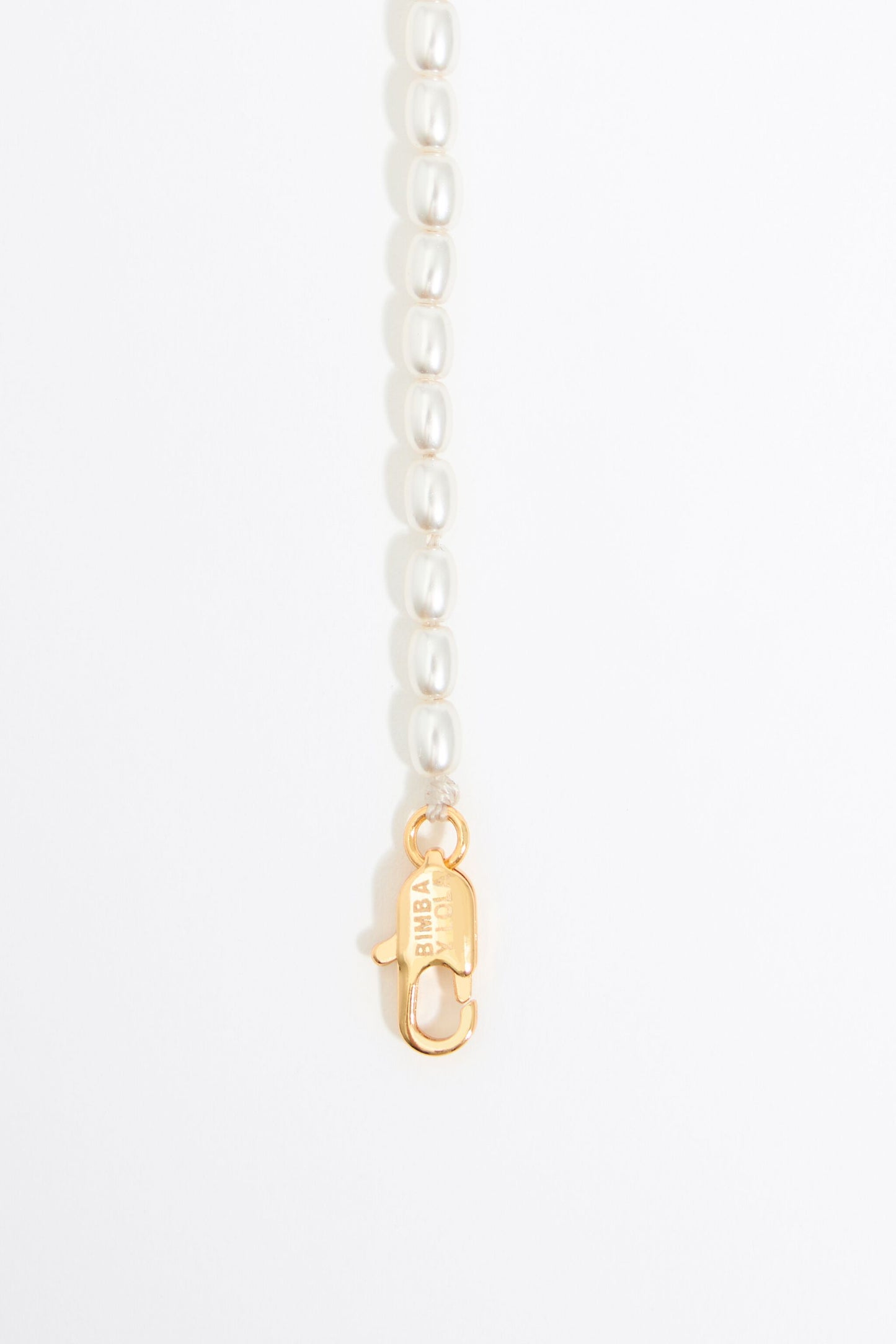 Pearl necklace with butterfly, ladybug and bee