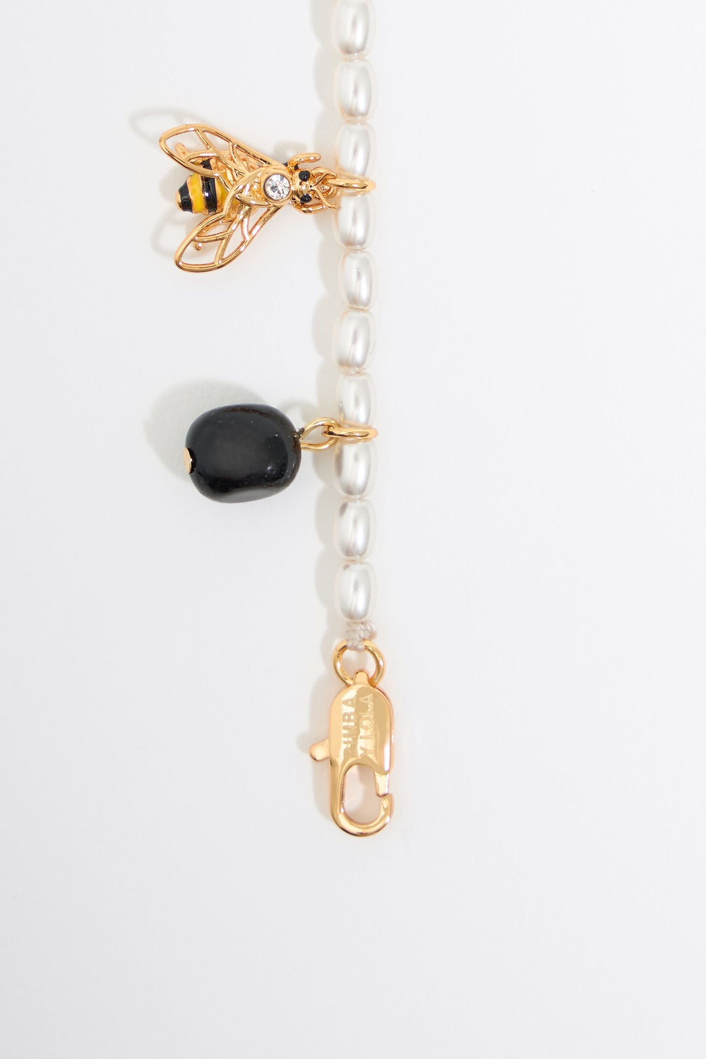 Pearl bracelet with butterfly, ladybug and bee