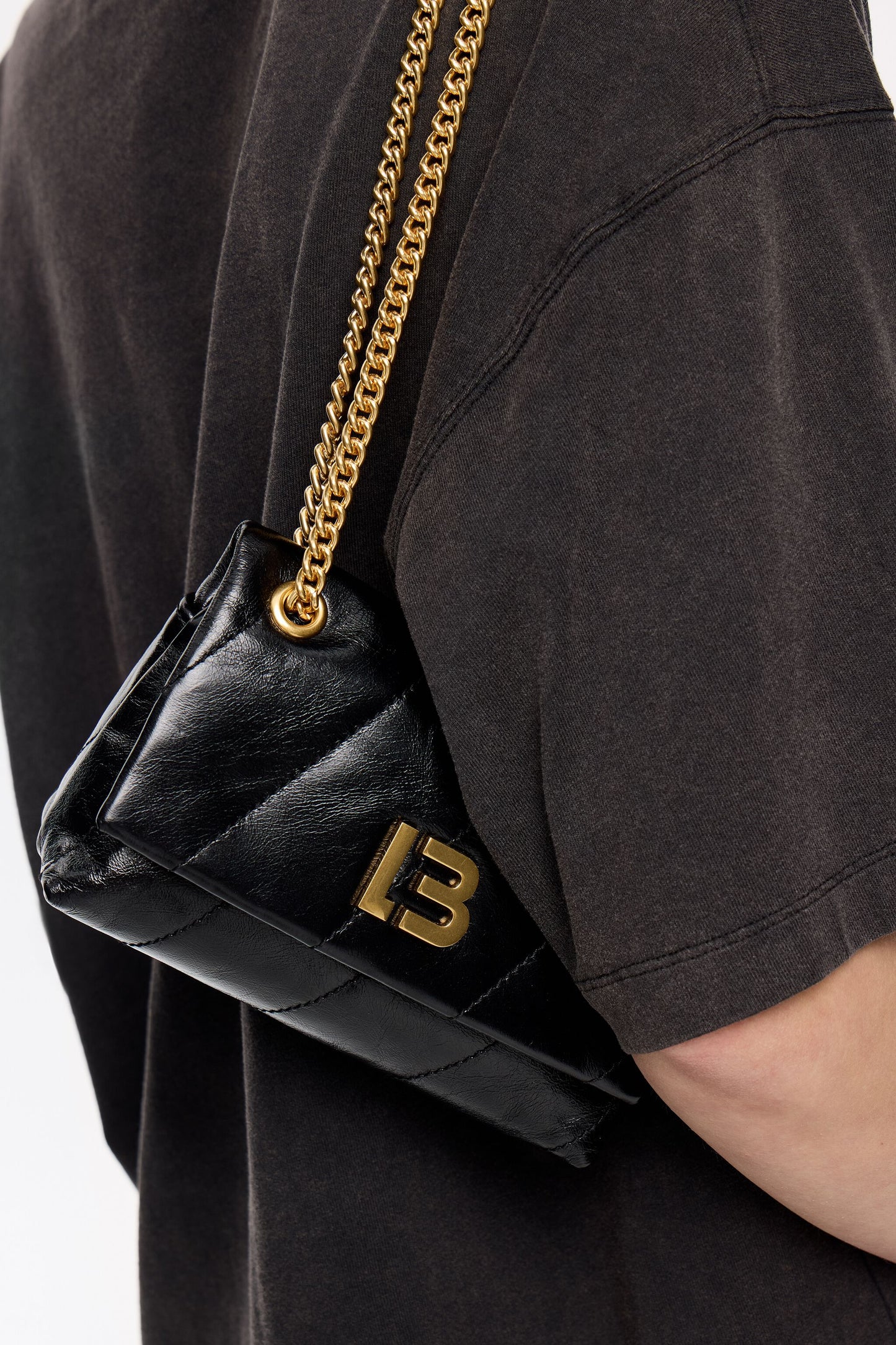 Mini black leather flap bag