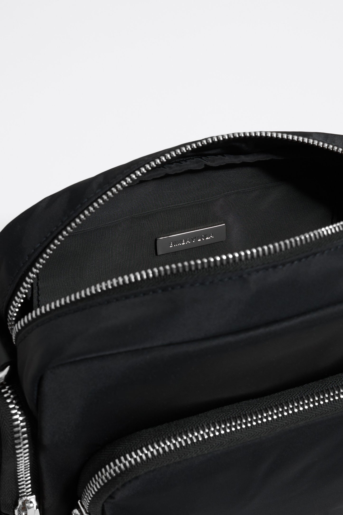 Medium black multi-pocket crossbody bag