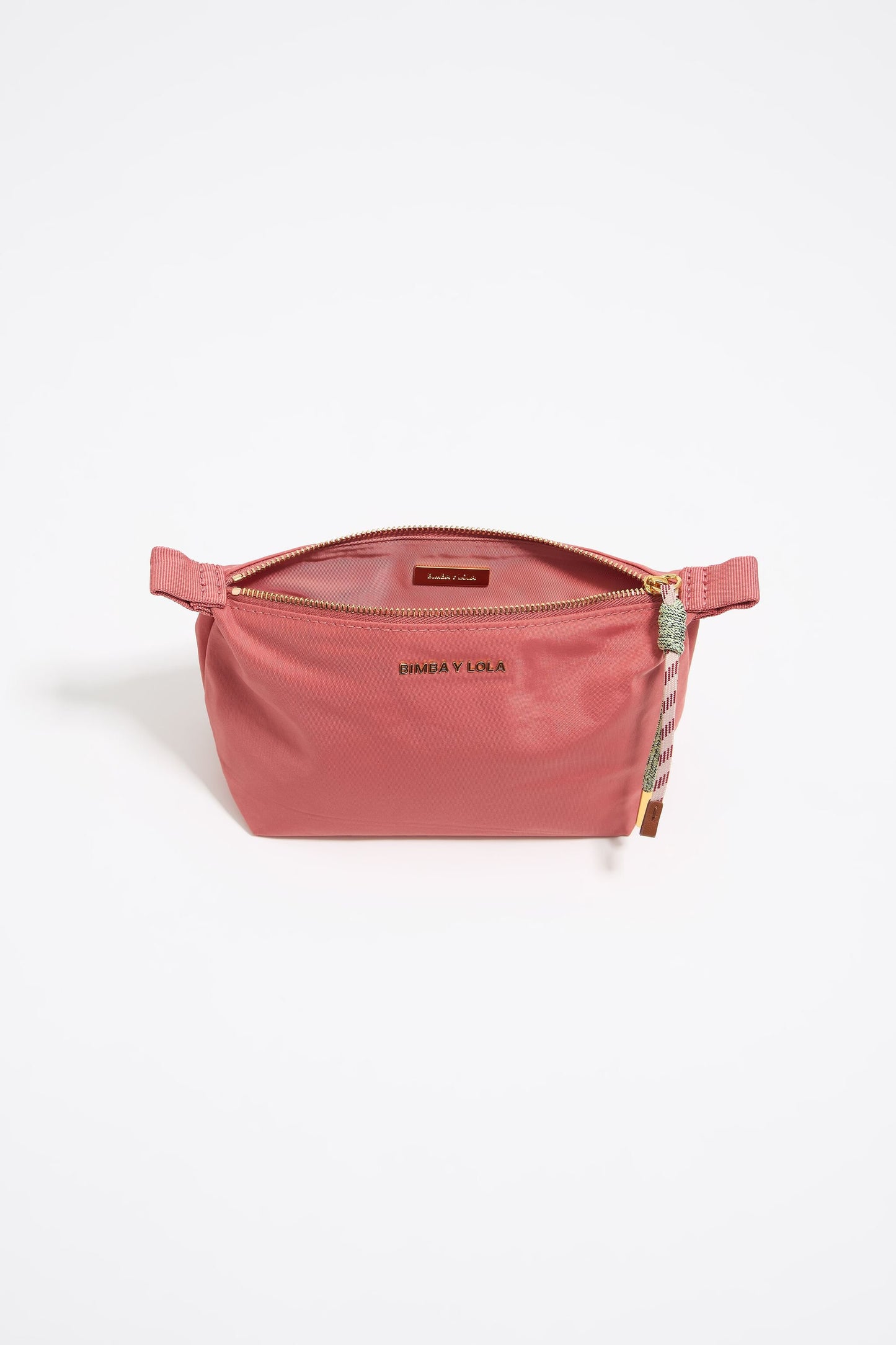 Small pink nylon trapezium make-up case