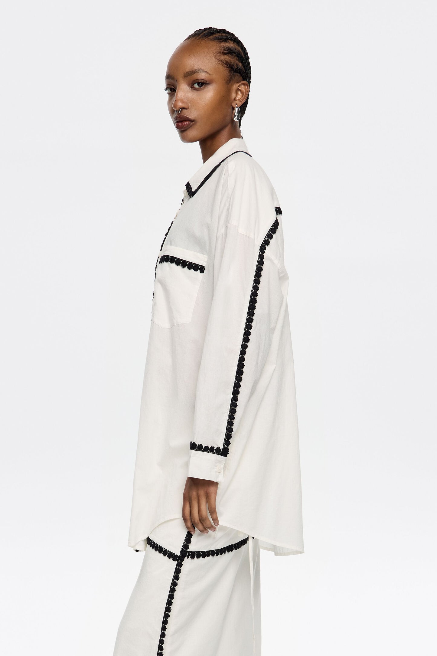 White shirt with raised embroidery