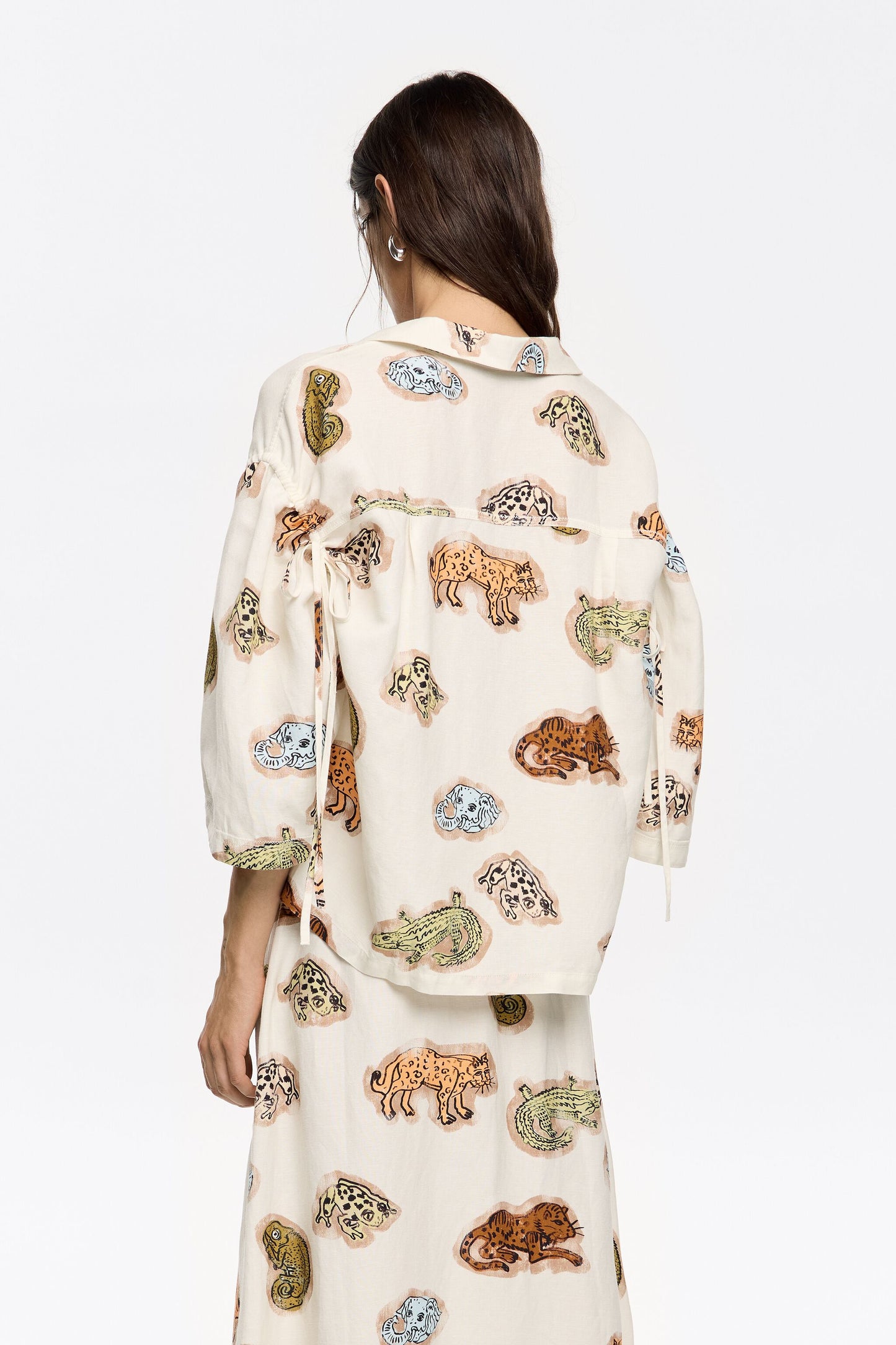 Brown Jungle Community linen boxy shirt