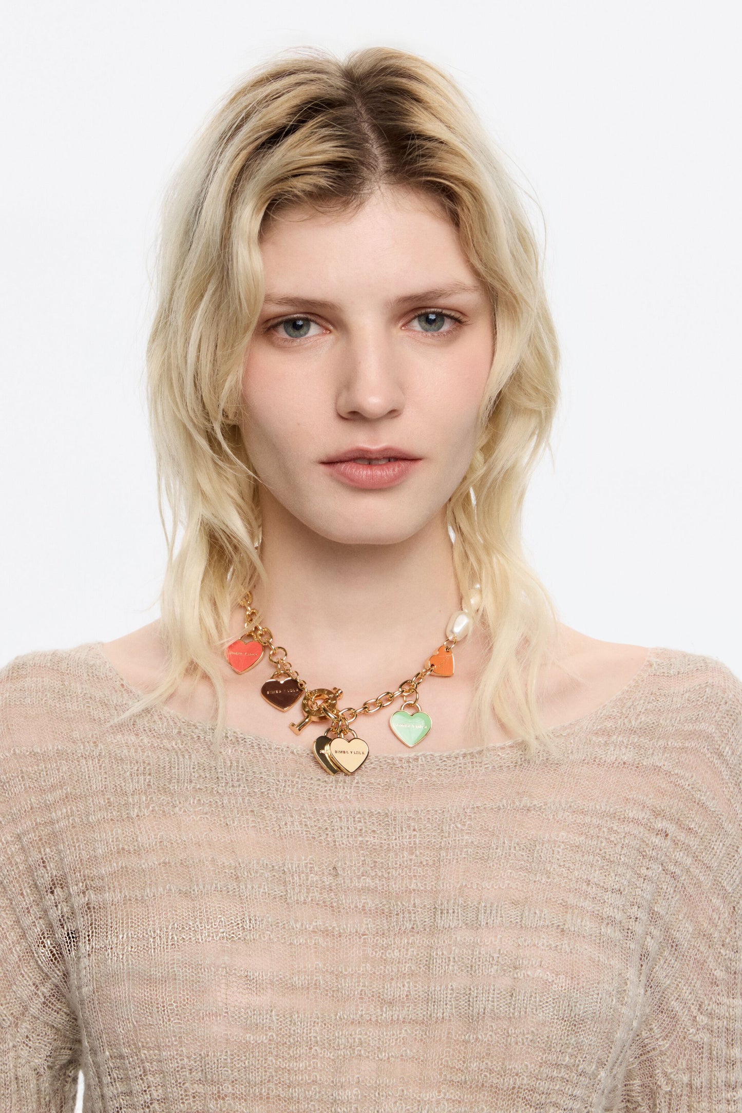 Gold-tone chain and pearl hearts logo necklace