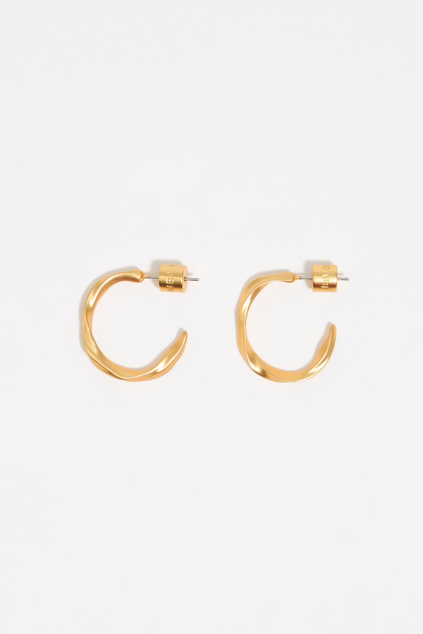 Matte gold uneven hoop earrings