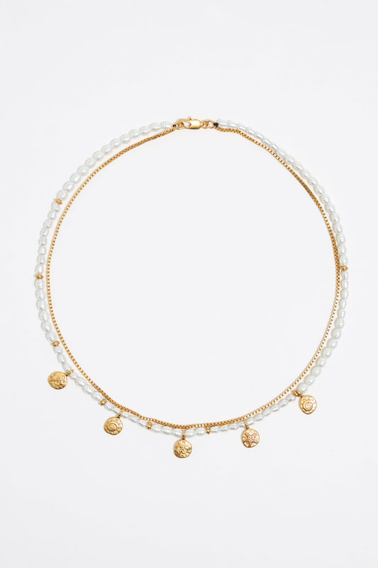 Gold coin logo and pearl necklace