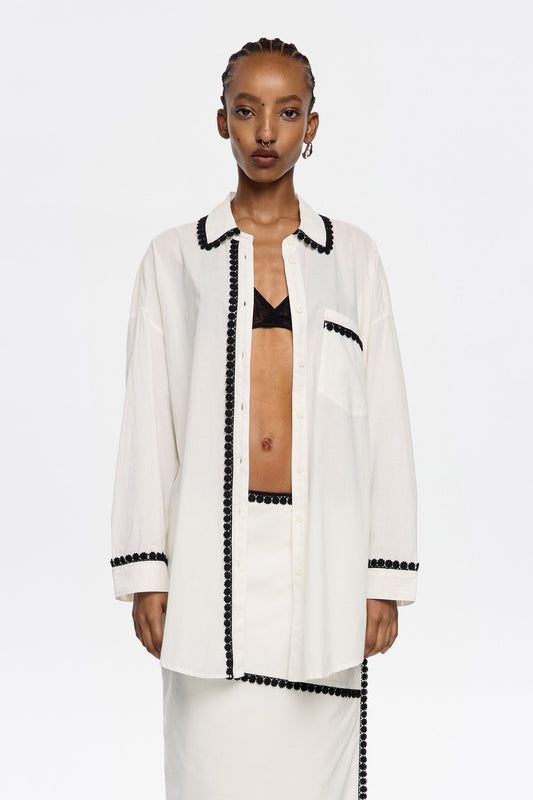 White shirt with raised embroidery