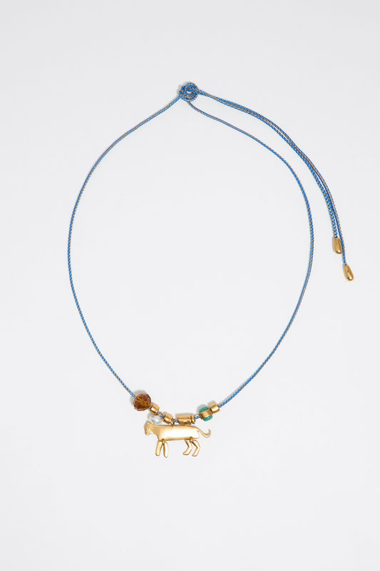 Long plaited cord necklace with gold-tone metal motifs